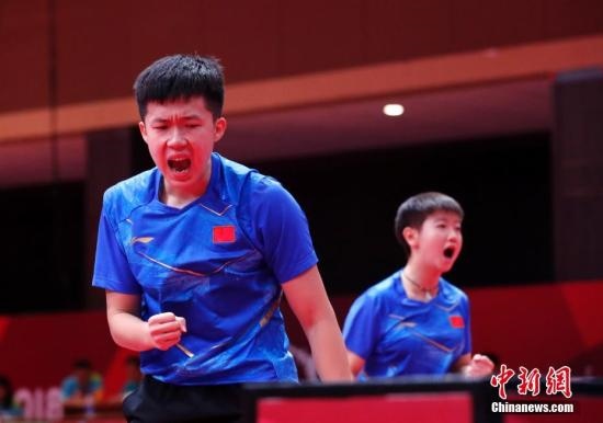 資料圖：雅加達亞運會，王楚欽/孫穎莎奪得混雙冠軍。 <a target='_blank' href='/'>中新社</a>記者 劉關關 攝