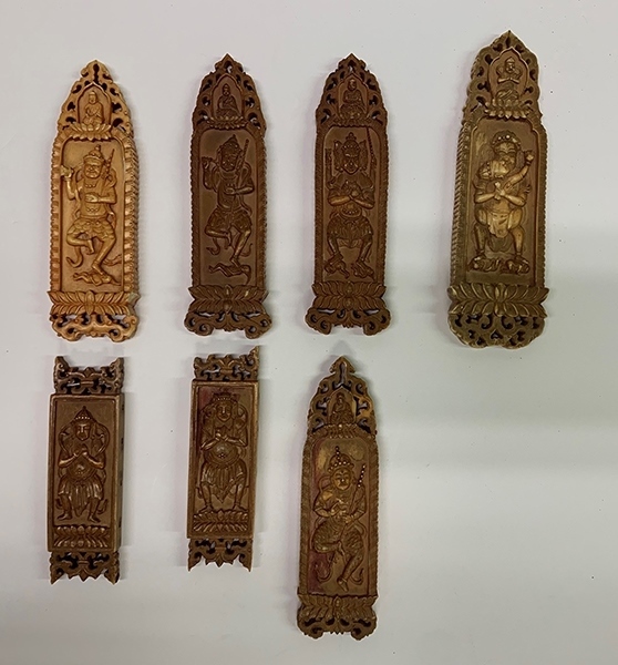 木雕牌飾（暫定名）。國(guó)家文物局供圖