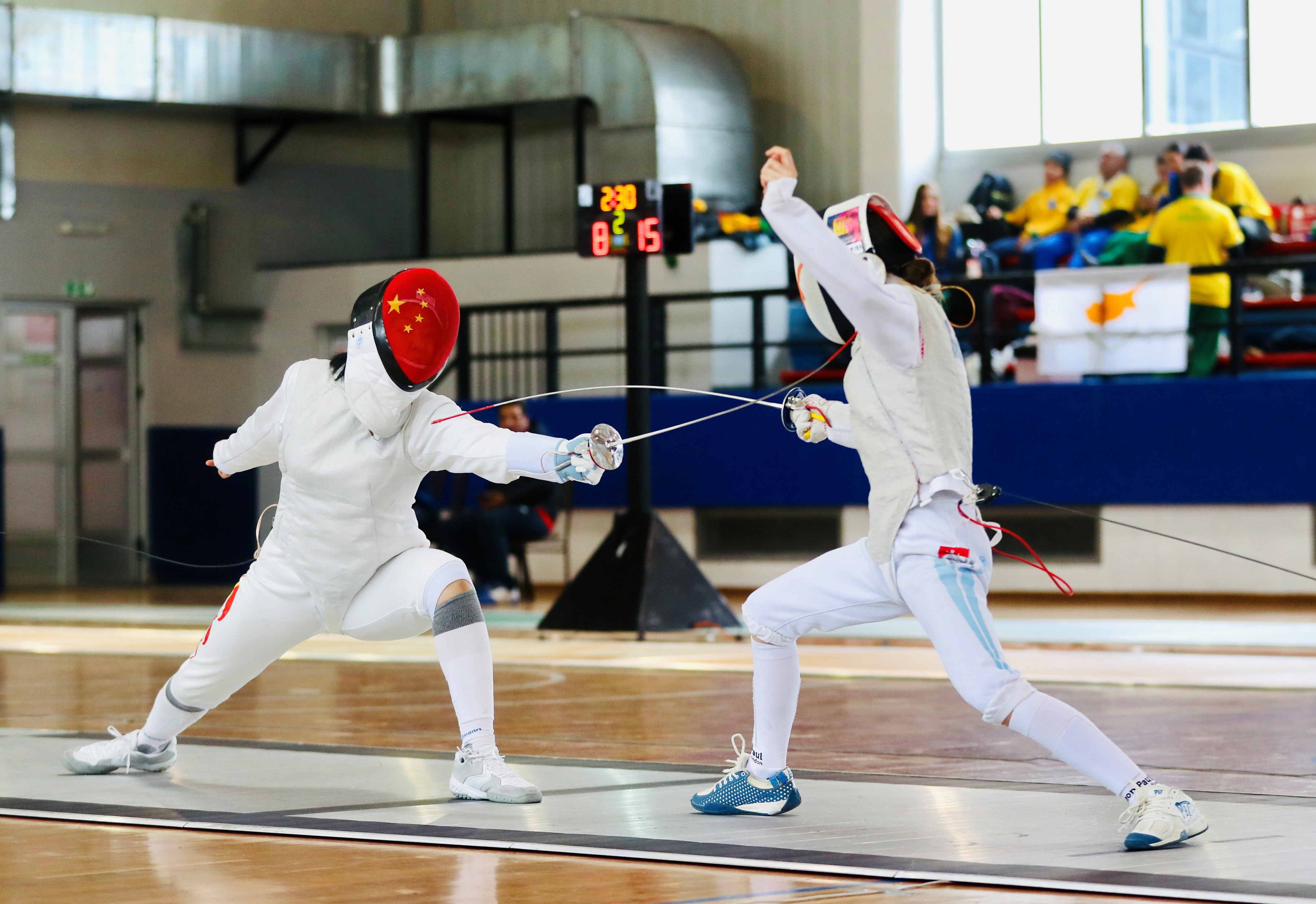 閔文珺（左）在比賽中。圖片來源：中國中學(xué)生體育代表團(tuán)